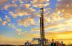 Oil gains as US rig count drops