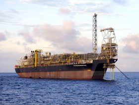 Oil prices gain as IEA reports supply cuts