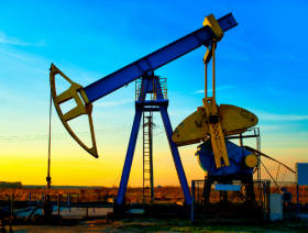 ConocoPhillips’ profits down, output up