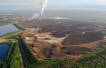 Total stepping back from oil sands
