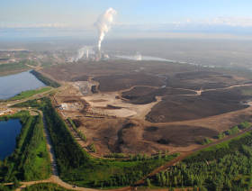 Total stepping back from oil sands