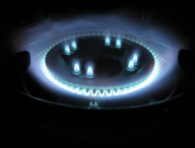 US natural gas prices fell to a 13-year low on Monday in response to forecasts of a mild winter, which will lower heating demand through the end of the month.