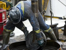 Shell profits halved in 2015