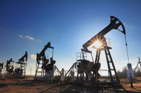 Oil up, on global signs of economic recovery