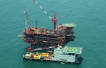 India fines Reliance USD 1.55 billion