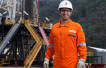 Total raises profit, sees revenue slip