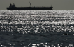 Crude oil prices slip, gasoline futures trade higher