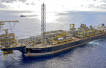Oil down on stronger dollar, weak US economic data